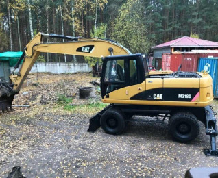 Полноповоротный экскаватор CAT M318D